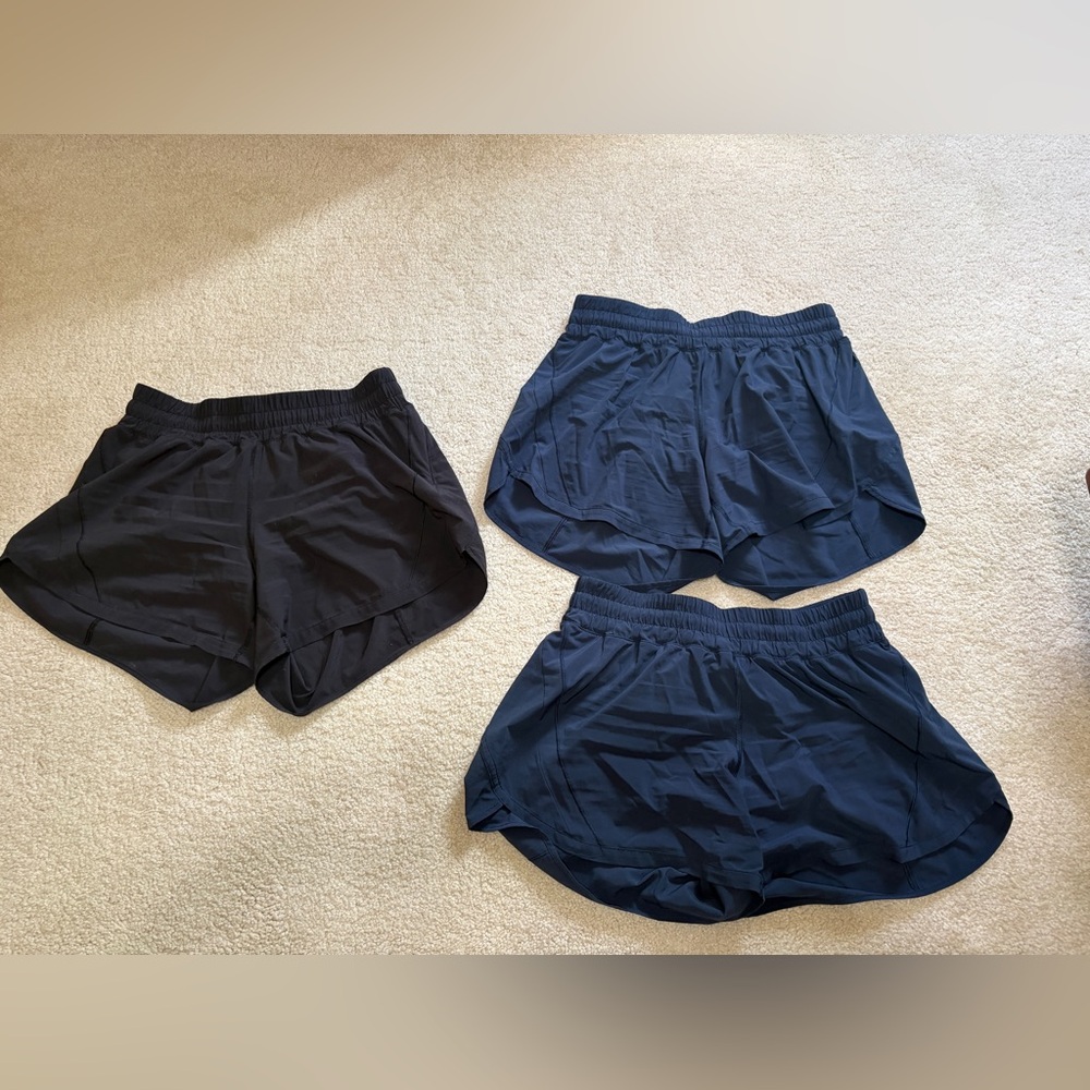 Set of Three Lululemon Size 10 5” Tracker MR shorts Navy and Black